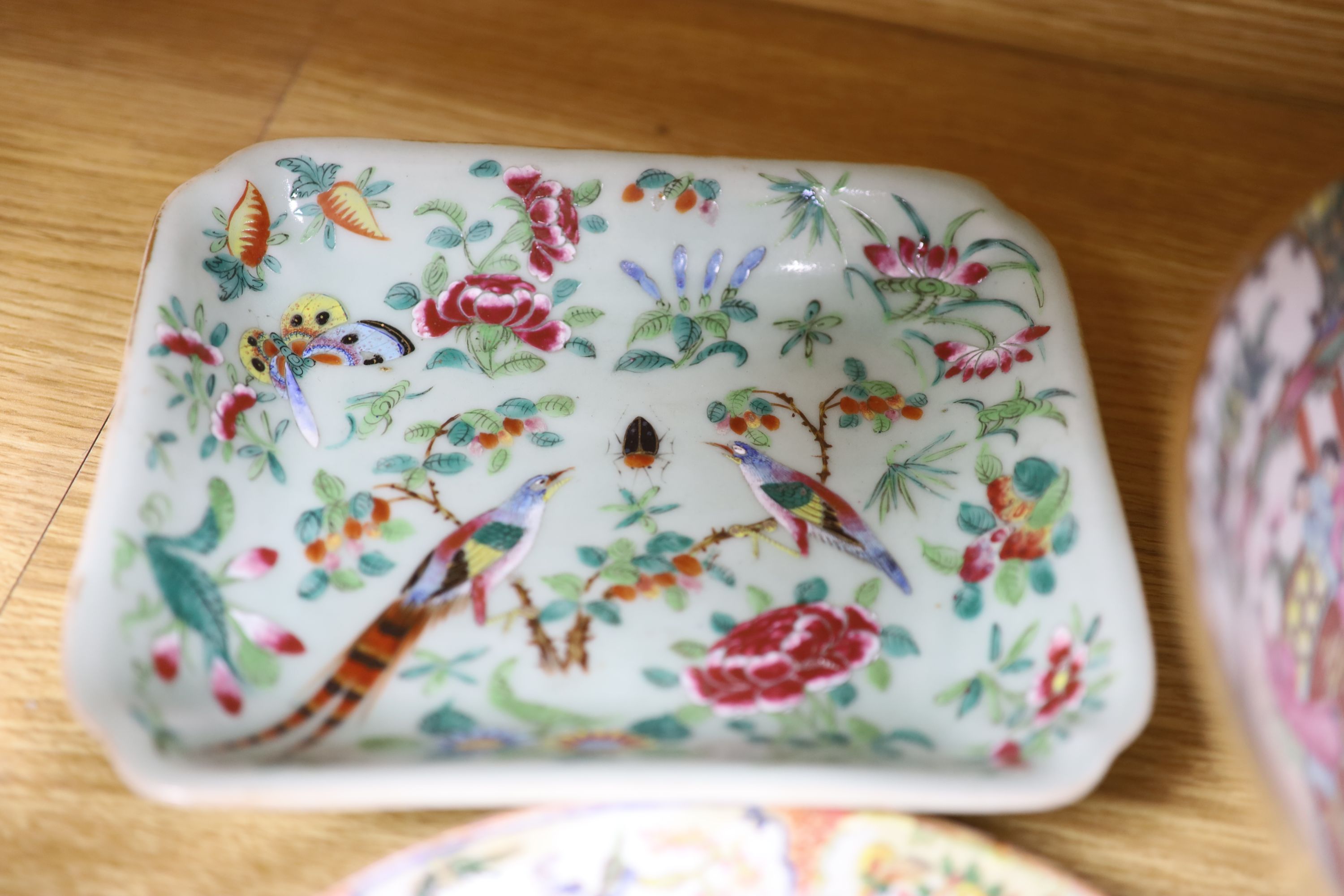 A Chinese pink ground bowl, late 19th century together with two other bowls, a famille verte dish and a plate